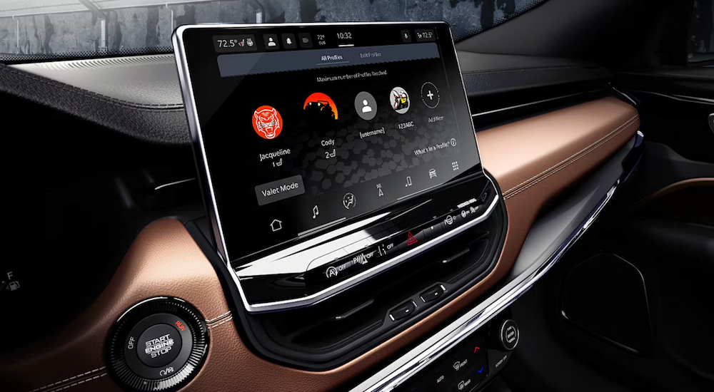 Close-up of the infotainment screen in a 2024 Jeep Compass at a Jeep dealer near Newark.