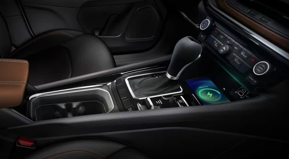 Close-up of the center console in a 2024 Jeep Compass.