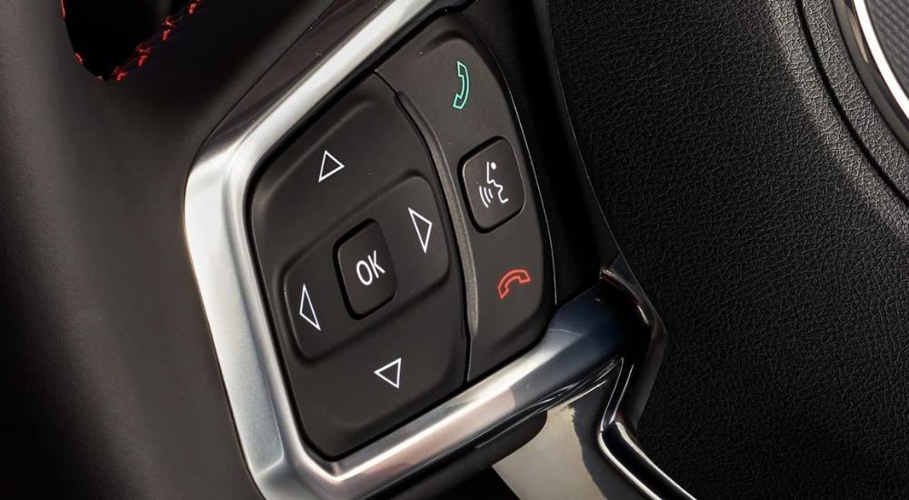 Steering wheel controls in a 2023 Jeep Wrangler.